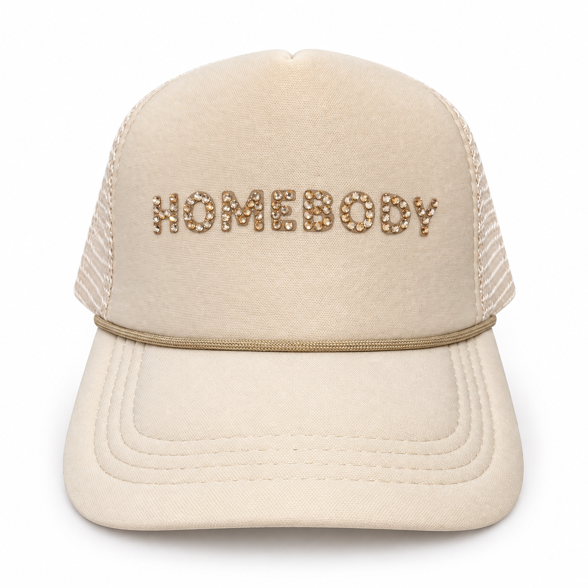 Cream trucker hat with champagne-toned rhinestone HOMEBODY lettering, cream mesh panels, and tonal rope trim.
